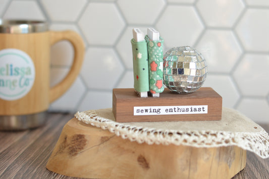 Mint Green Mini Fabric Bolts with a Disco Ball M23